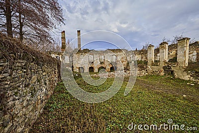 the ruins of a church invaded by vegetation Stock Photo