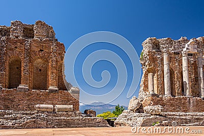 Ruins and columns of antique greek theater in Taormina Stock Photo