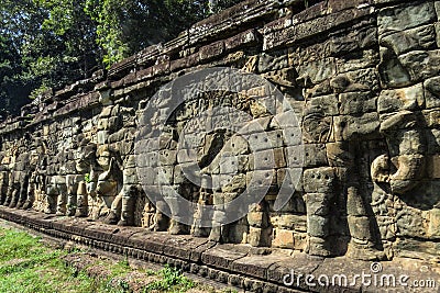 Ruins of complex of religious temple of Angkor Wat, Cambodia. View of wall with elephants Stock Photo