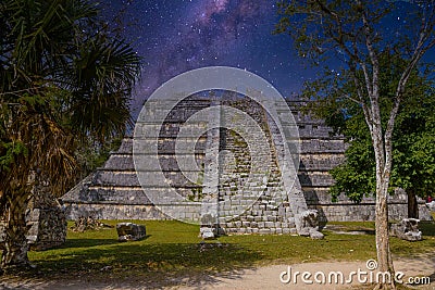 Ruins of El Osario pyramid, Chichen Itza, Yucatan, Mexico, Maya civilization with Milky Way Galaxy stars night sky Stock Photo