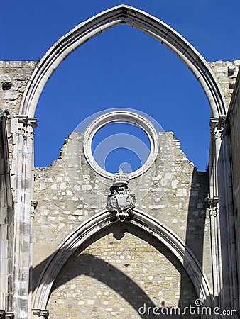 Ruins of the Gothic Church of the Carmo Convent aka Our Lady of Mount Carmel. Roofless nave and arches stand as a testimony to the Stock Photo