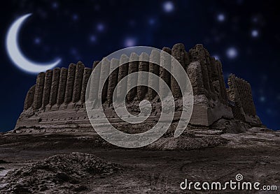 Ruins of the Great Kyz Kala located in ancient Merv in the Mary province, Turkmenistan at night with a new crescent moon on a sta Stock Photo