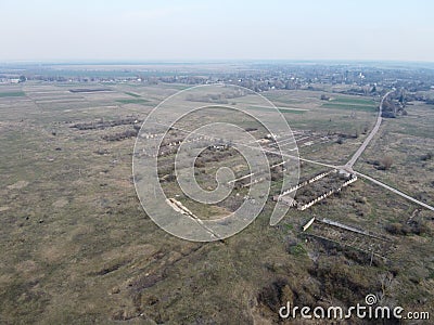 The ruins of a livestock farm, aerial view. Destroyed animal sheds Stock Photo
