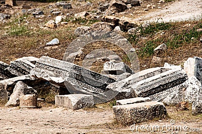 Ruins and old buildings in Hierapolis ancient city adjacent to modern Pamukkale in Turkey Stock Photo