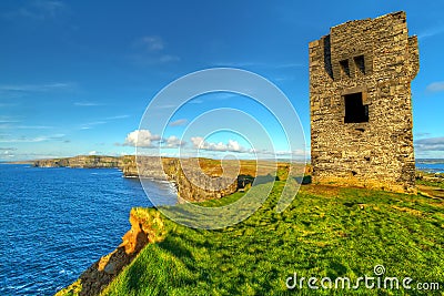 Ruins of old castle on Cliffs of Moher Stock Photo