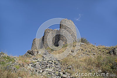 Ruins of an old castle. Entrance door and window of an old castle. Fortress towers and walls Stock Photo