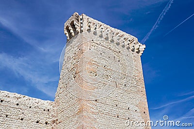Ruins of old medieval castle . fortified wall and tower detail brick Stock Photo