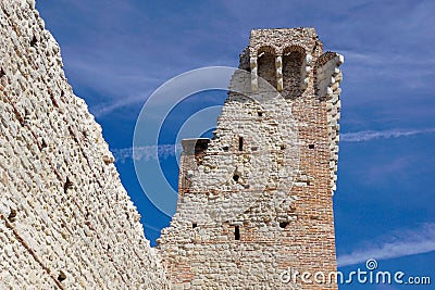 Ruins of old medieval castle . fortified wall and tower detail brick Stock Photo