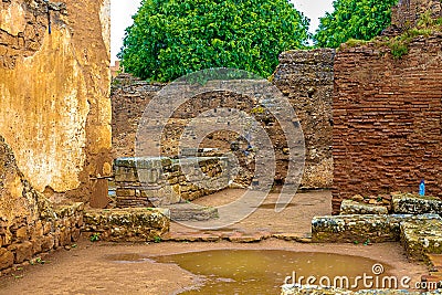 Ruins of the Roman city known as Sala Colonia and the Islamic complex of Chellah, mosque and minaret ruined Stock Photo
