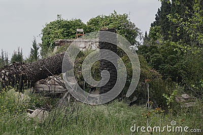 Ruins and rubble consumed by nature Stock Photo