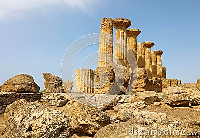 Ruins of the Temple of Heracles in famous ancient Valley of Temples of Agrigento, Sicily, Italy. UNESCO World Heritage Site Stock Photo