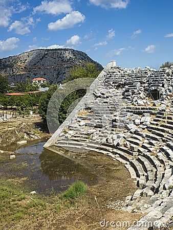 Ruins of Theatre in Letoon Ancient City in village Kumluova, Turkey. Sunny day, Greek culture ancient amphitheater Stock Photo