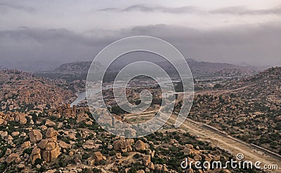 Ruins of Vijayanagar, the former capital of the Vijayanagar Empire, in Hampi Editorial Stock Photo