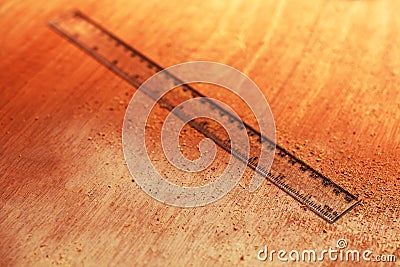 Ruler against plywood and sawdust Stock Photo