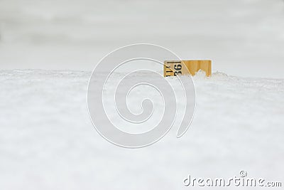 Ruler in Snow 36 Inches Close Stock Photo