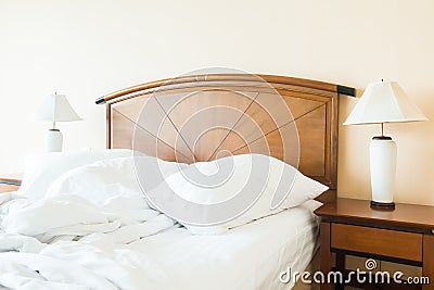 Rumple pillow on bed Stock Photo