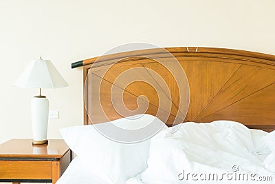 Rumple pillow on bed Stock Photo