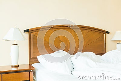 Rumple pillow on bed Stock Photo