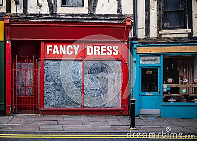 Run down closed shop boarded up local business retail store in economic bankrupt recession hit old market town out of business Stock Photo