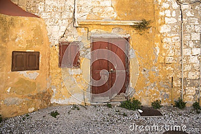 Run down houses near the Church of Saint-Marie-du-Bourg Stock Photo