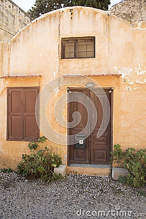 Run down houses near the Church of Saint-Marie-du-Bourg Stock Photo