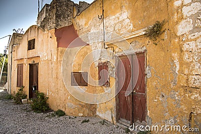 Run down houses near the Church of Saint-Marie-du-Bourg Stock Photo