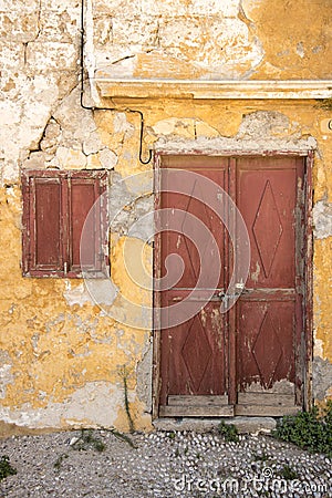 Run down houses near the Church of Saint-Marie-du-Bourg Stock Photo