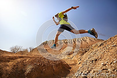 Runner in the desert Stock Photo