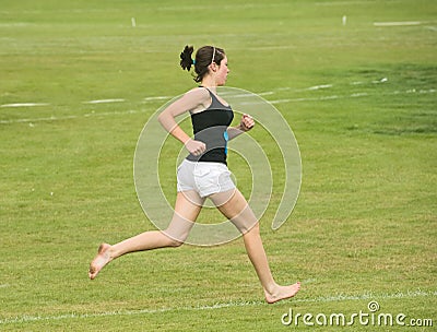 Runner in bare feet at Nairn. Editorial Stock Photo