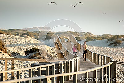 Runner on the beach Editorial Stock Photo