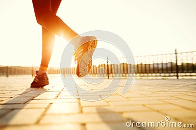 Runner feet running on road closeup on shoe. Stock Photo