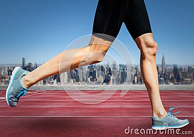 Runner legs on track against skyline Stock Photo