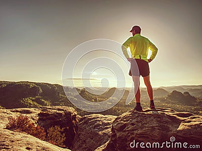 Runner man on rocky road of mountain nature. Male sprinter Stock Photo