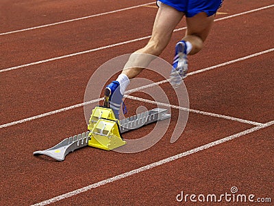 Runner Off the Starting Block Stock Photo