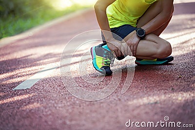Runner suffering with pain on sports running injury Stock Photo