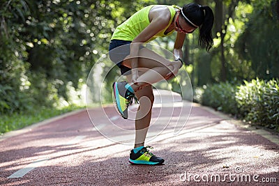 runner suffering with pain on sports running injury Stock Photo