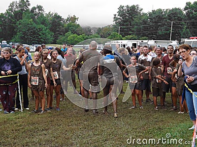 Runners Finish Mud Race Editorial Stock Photo