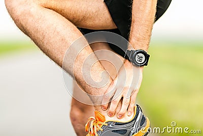 Runners knee pain injury Stock Photo