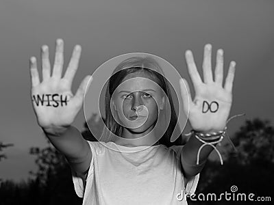 Runners Motivational Quote Written on Hands, Don`t Wish, DO! Stock Photo