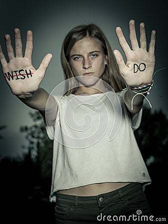 Runners Motivational Quote Written on Hands, Don`t Wish, DO! Stock Photo