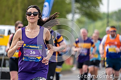 Runners running in the Rob Burrow Leeds Marathon 2023 Editorial Stock Photo
