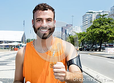 Running caucasian man with beard Stock Photo