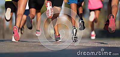 Running children, young athletes run in a kids run race,running on city road Stock Photo