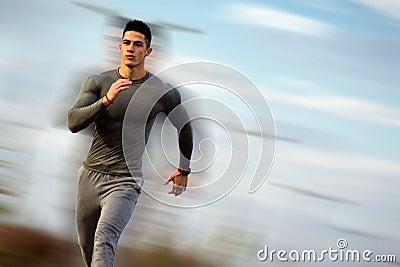 Running handsome sportsman Stock Photo