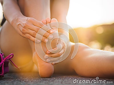 Running injury leg accident- sport woman runner hurting holding Stock Photo