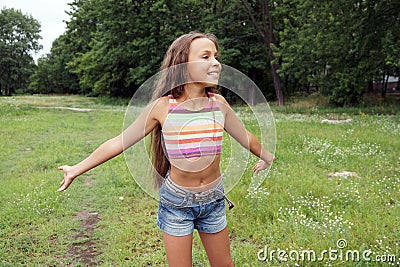 Running preteen girl Stock Photo