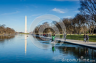Running into Reflecting Pool - Washington DC Editorial Stock Photo