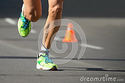 Running shoes, feet and legs close up of runner Stock Photo