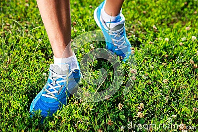 Running shoes on grass. Stock Photo
