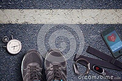 Running shoes and stopwatch. Hart rate sensor and watch whit pulse. Stock Photo